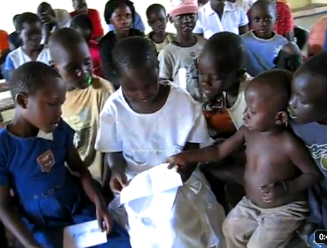 Watching this children open, read and share their Christmas cards that we sent to them