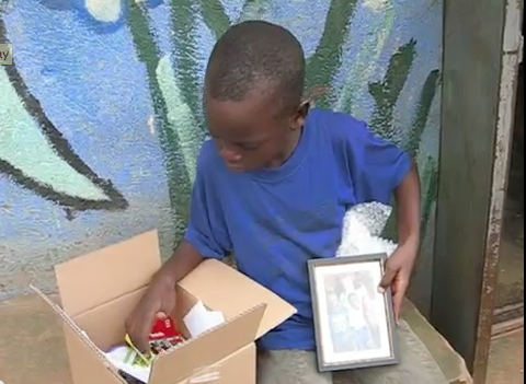 Steven opening his Christmas present