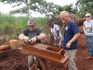 Dad and John making bricks