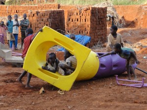 The kids playing on the side before it is built